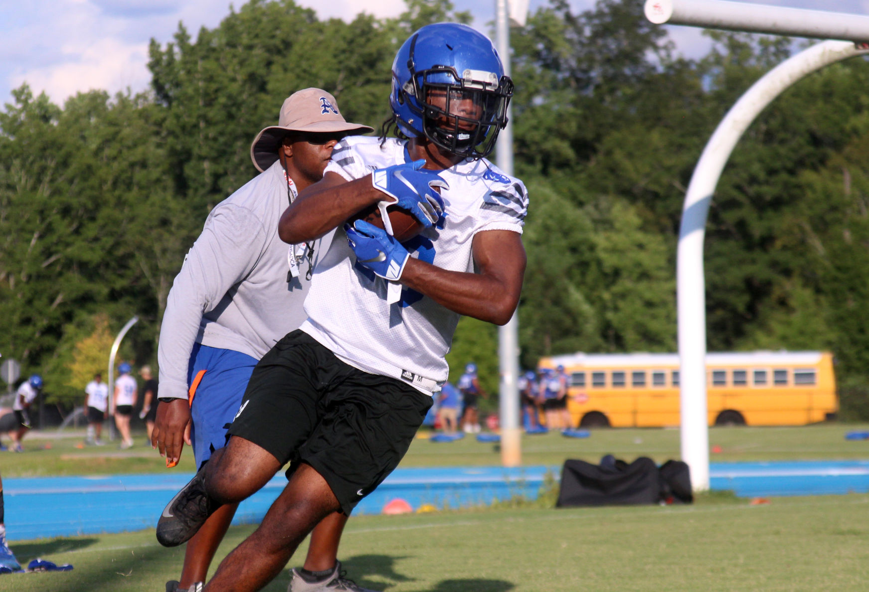 PHOTOS: Area teams open first day of high school football practice